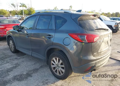 2014 Mazda Cx-5 Sport from USA, damaged, VIN JM3KE2BE9E0321600